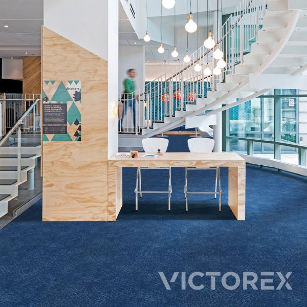 Victorex Array carpet tiles Blueprint colour in library with spiral staircase