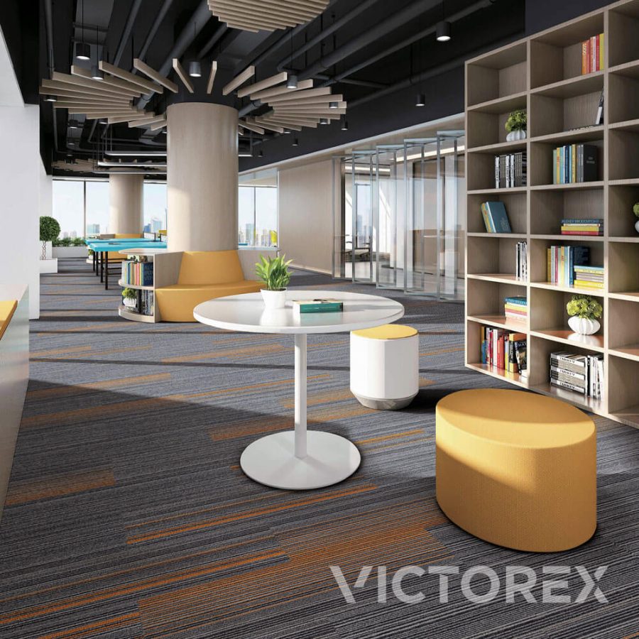 Victorex Brigthline carpet tiles Pumpkin colour in co-working space with round chairs