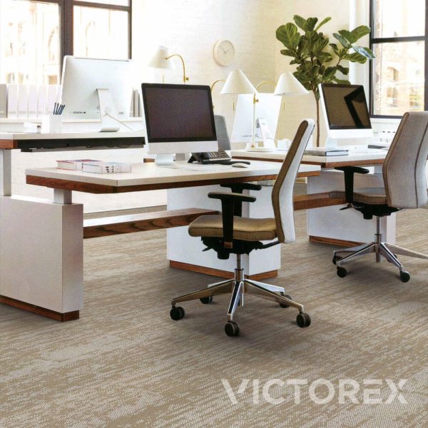 Victorex Expanse carpet tiles Lakebed colour in office with computers and potted plant
