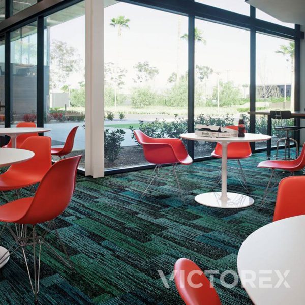 Interface Aerial AE317 plank carpet tile in cafe area in Emerald colour