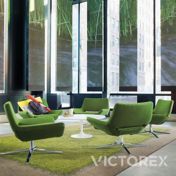 Interface Urban Retreat UR103 carpet tile as area rug in Grass, in seating area with green chairs and white table; UR101, Flax/Grass colour