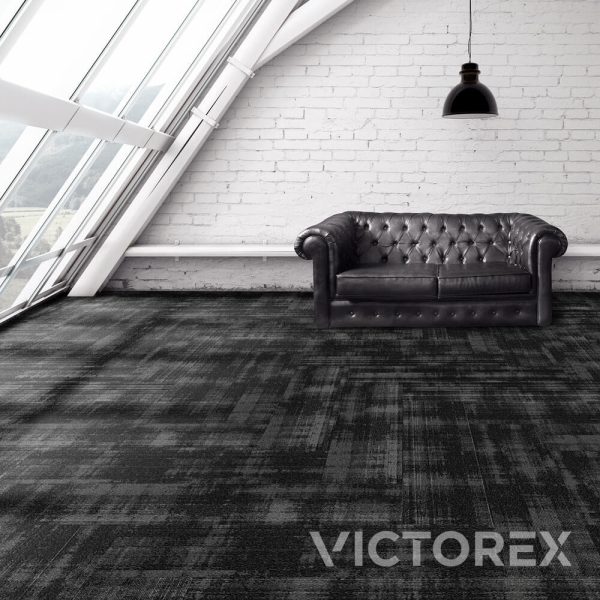 Victorex Morse Code 2.0 carpet tiles Metal Black colour in room with large slanted windows