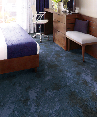 Victorex Broadloom Carpet Page Geoscape Sea Waves colour in a bedroom with vase on the office desk Victorex Broadloom Carpet Page Geoscape Sea Waves colour in a bedroom with vase on the office desk